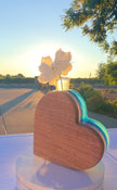 Back of the heart bud vase showing the solid wood body and hand-poured resin edge